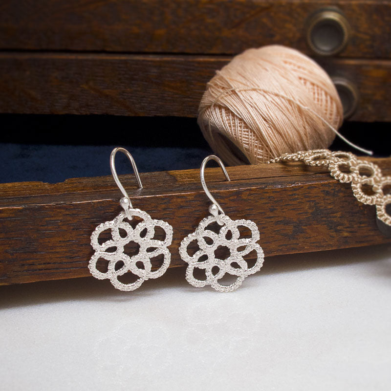 Silver deals mandala earrings